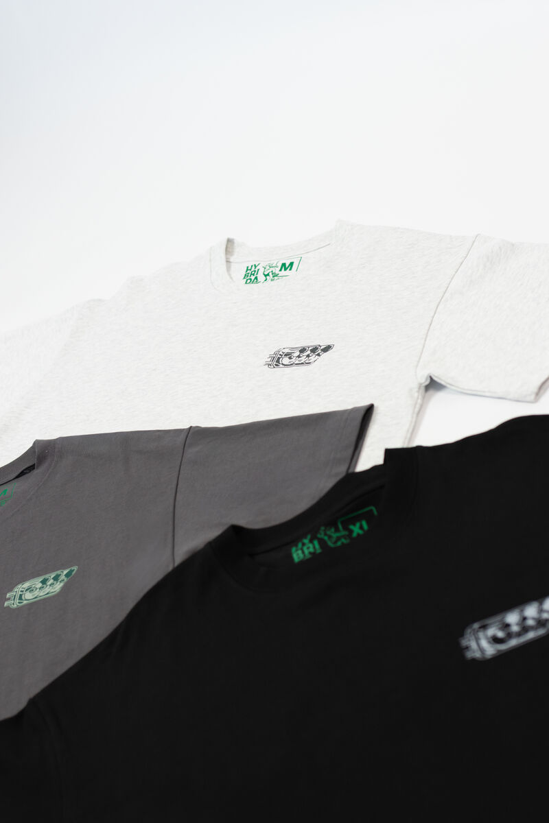 Drop 001 — Foundation Tee 01 · 3-piece colorway stack: Bone Heather, Concrete, Black